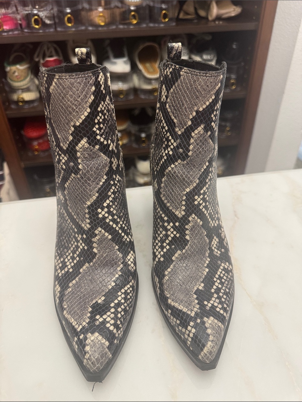 Marc Fisher Snake-Print Pointed Ankle Boots in Black and Tan